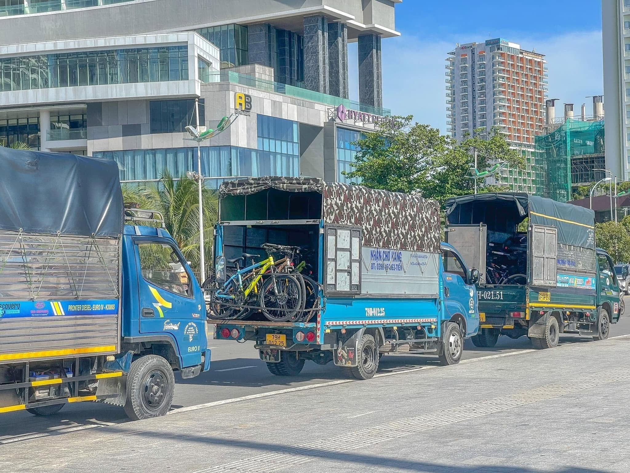 Delivery trucks loaded with rental bicycles near the Hyatt in Nha Trang